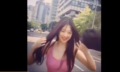 雪莉大胆真空穿吊带外出 无内衣风格大尺度引发争议